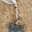 A handcrafted easter candle made from natural beeswax and decorated with a high quality wooden train.